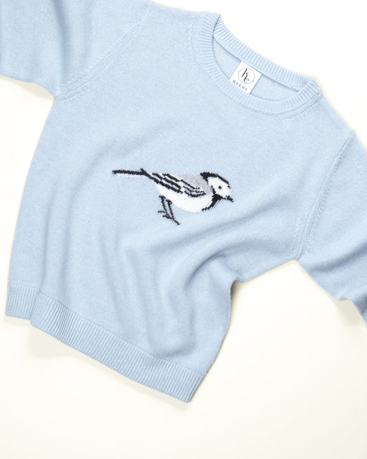 Genser i lett ull med linerle.