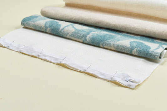 Oppsirkulert putetrekk laget av genser.