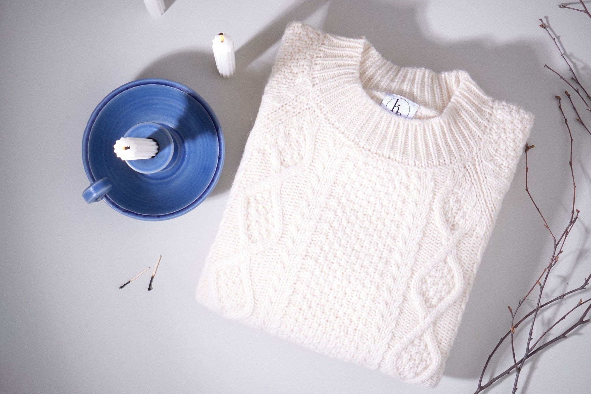 Flettestrikket fiskermansgenser i ull og alpakka