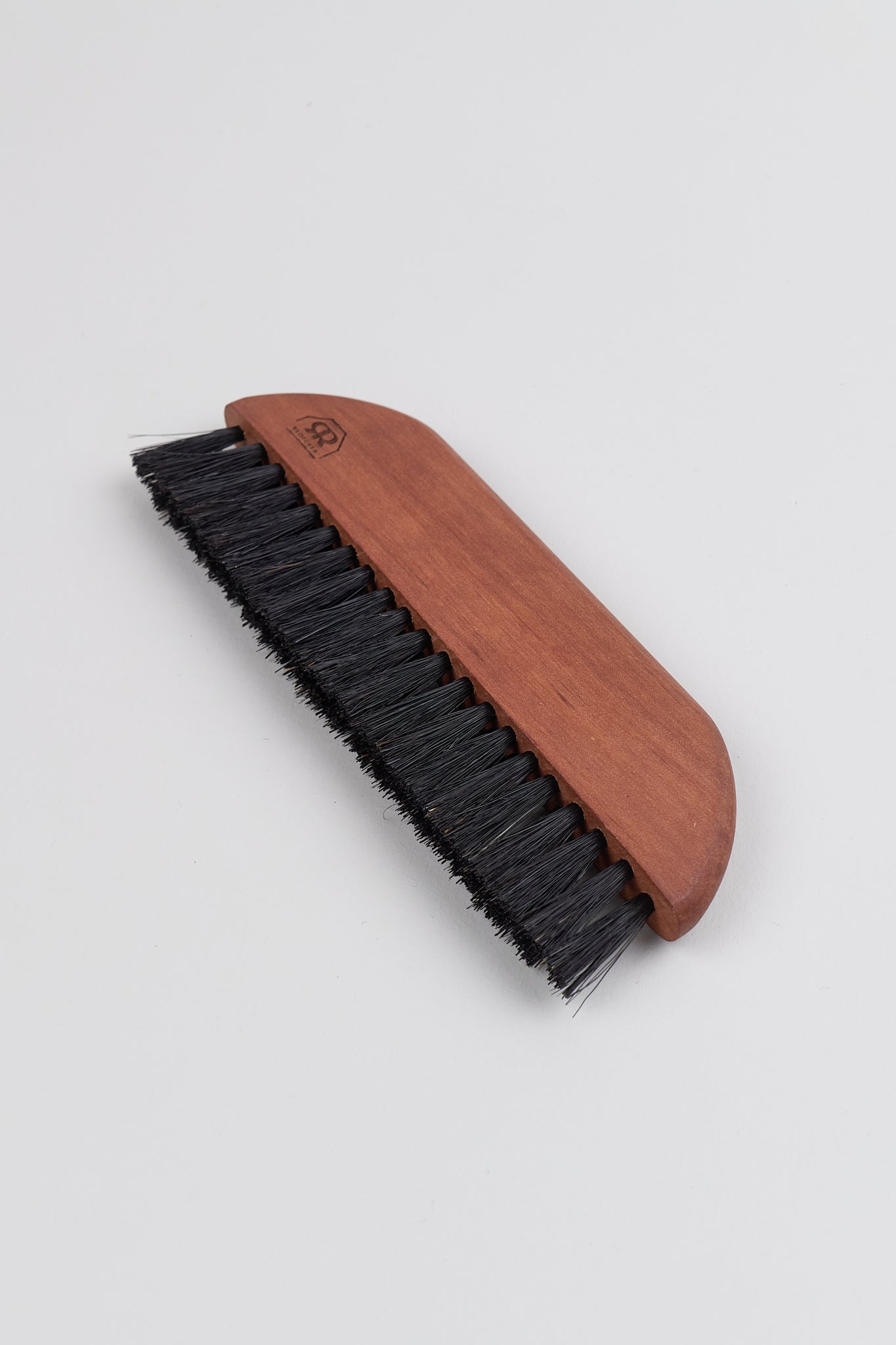 Liten klesbørste i lommestørrelse til alle tekstiler.